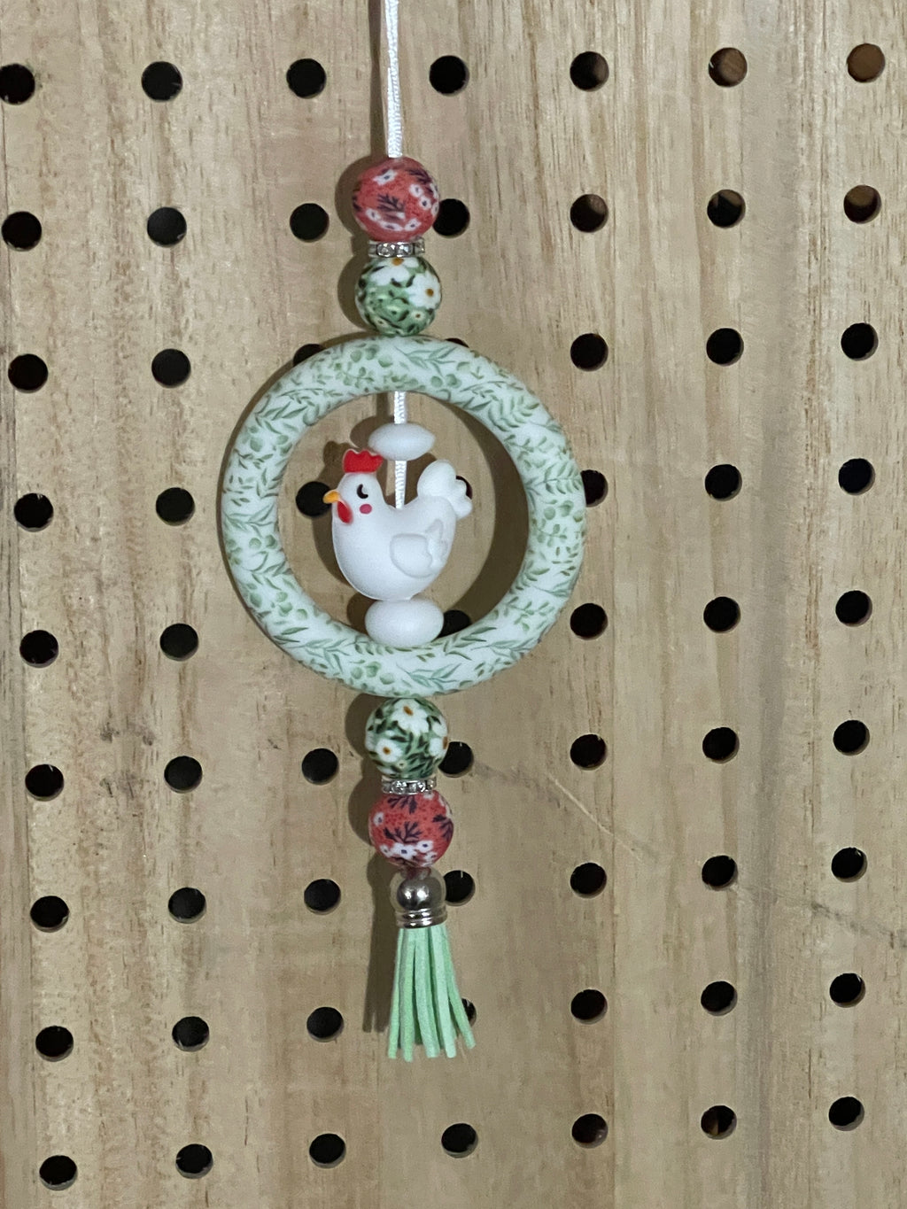 Green, white and red with chicken car charm